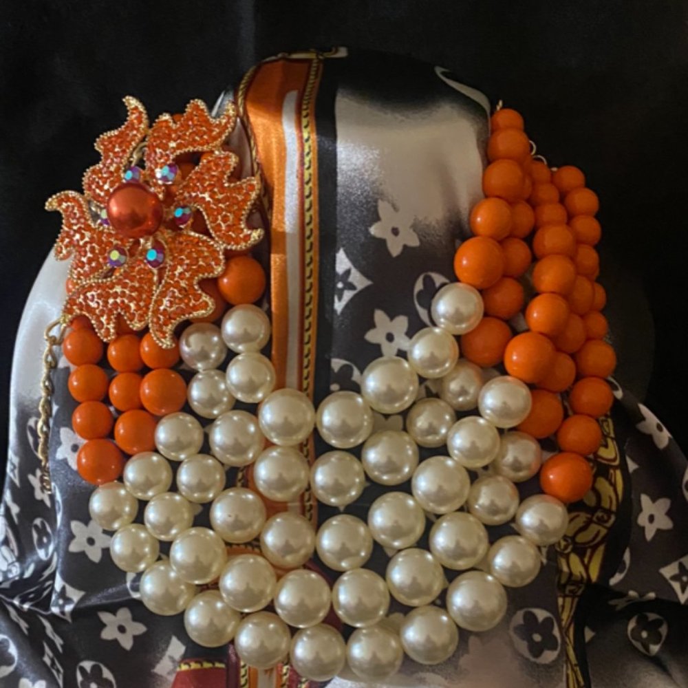 Brand new orange and cream necklace
